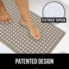 Gorilla Grip Alfombrilla de baño y ducha patentada, 35 x 16, lavable a máquina, alfombrillas de baño extragrandes con orificios de drenaje y ventosas para mantener el suelo limpio, suave para los pies, accesorios de baño, beige opaco - Imagen 3