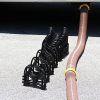 Camco 43031 Soporte de manguera de alcantarillado Sidewinder RV de 10 pies, hecho de plástico resistente y liviano, no se cierra, mantiene las mangueras en su lugar, sin necesidad de correas - Imagen 4