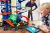 Hot Wheels Ciudad Robo T-rex Último Garaje Multinivel Multi-