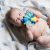 Nuby Squeezy Teethe Goma Teether- Pavo Real